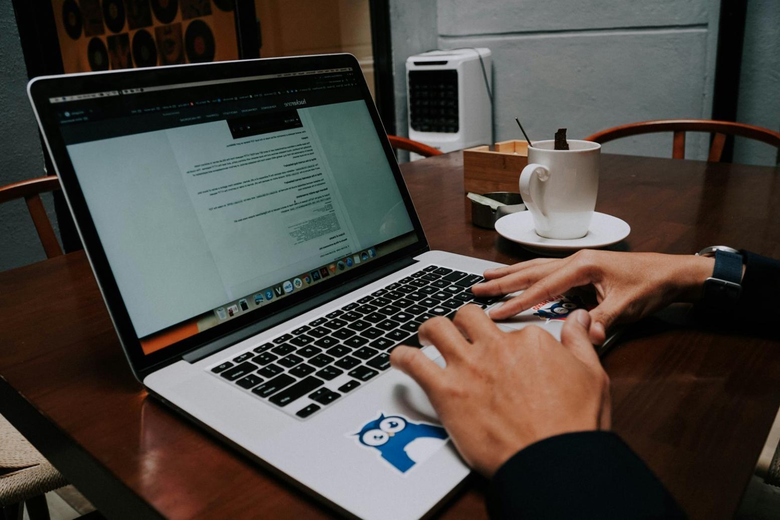 Students collaborating on blockchain development projects in modern learning environment